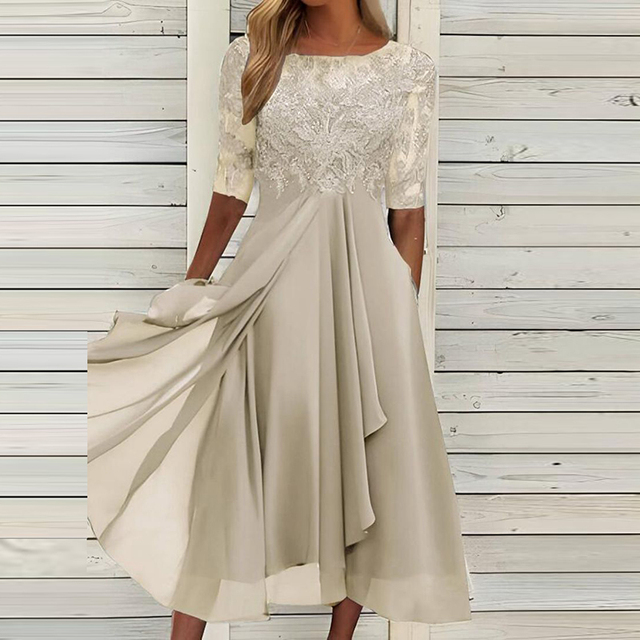 Elegantes Sommerkleid mit auffälligen Designdetails